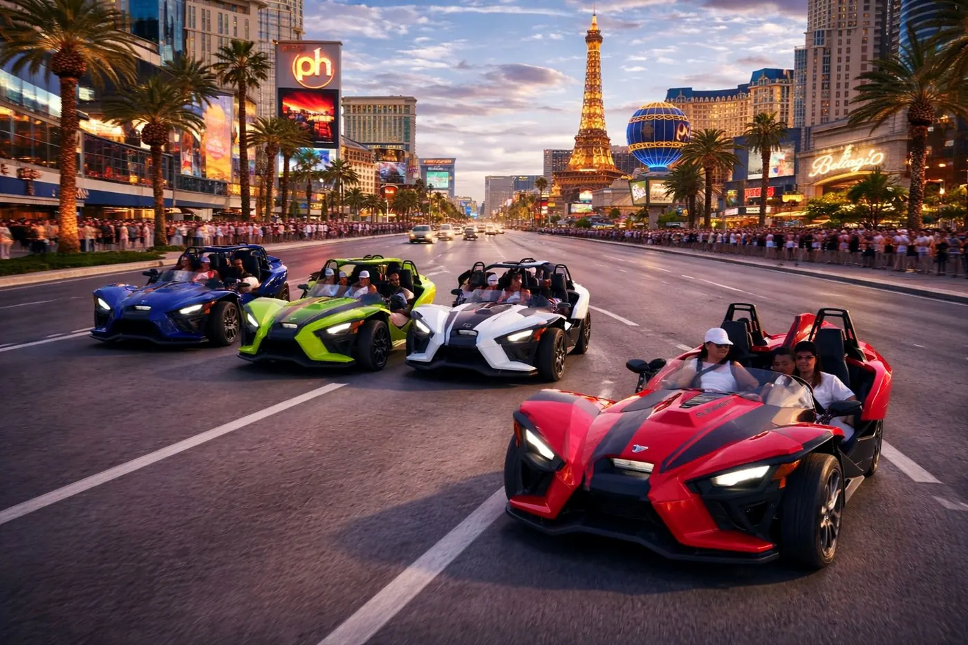 4 Da Thrills Polaris Slingshot fleet cruising the Las Vegas Strip at dusk